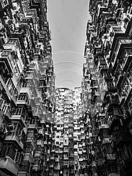 Black and white tone, Very Crowded but colorful building group in Tai Koo, Hongkong
