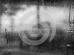 Black and white tone of water drops from home condensation on a