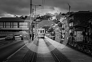 black and white tram through the streets