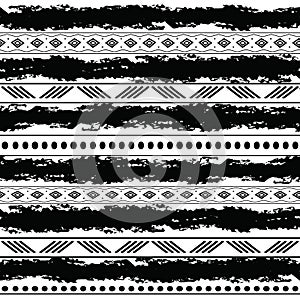 Black and white tribal vector seamless pattern with doodle elements. Aztec abstract geometric art print. Ethnic