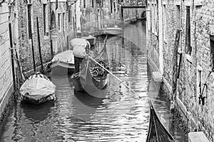 Black and white Venetian gondolier, Venice, Italy