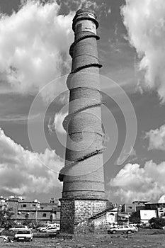 Vertical Highrise old Brick Chimney on a ground