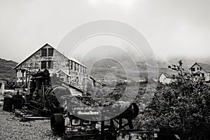 Black and white view of the abandoned Independence Mine along Alaska`s Hatcher Pass