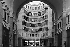 Black and white view from arch to monumental house, Yerevan, Armenia