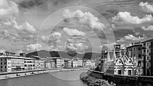 Black and white view of the beautiful Church of Santa Maria della Spina and the river Arno in Pisa, Tuscany, Italy