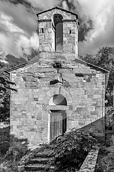 Black and white view of the Church of Santi Jacopo and Verano at the Costa d\'acqua, Calci, Pisa, Italy photo