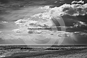 Black and white view of a cloudy day on the beach of Cubelles, Barcelona, Catalonia, Spain