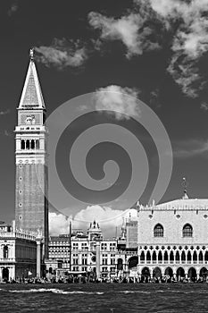 Black and white view of Piazza San Marco square and the Doge's Palace against a beautiful sky, Venice, Italy