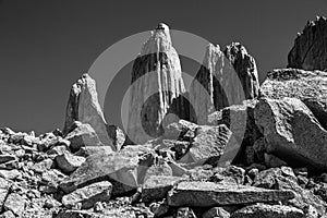 A black and white view of the three huge granite towers at the end of the W walk in Torres del Paine National Park