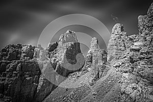 Black and white view of Torre di Pisa pinnacle in the Latemar Massif, Italy