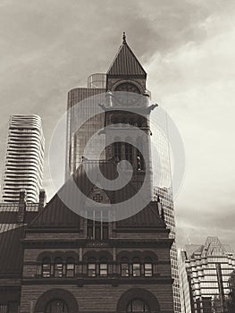 Black and white vintage classy historical architecture buildings downtown Toronto. Old clock tower Canada