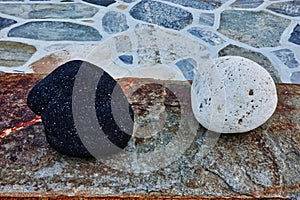 Black and White Volcanic Rocks on Ledge