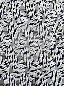 Black and white waved rope pattern on an Indian cot