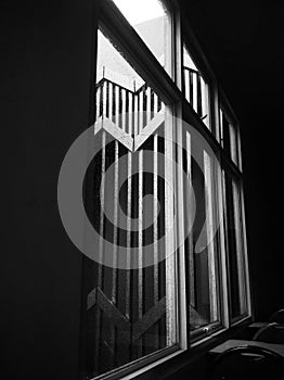 Black white window under rainy day in the classroom