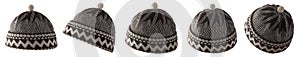 Black and white winter cap with pom-pom on white