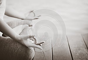 Black and white woman yoga finger acting on hands
