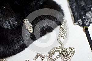 Black and white women accessories on the white backgroud. Lace g