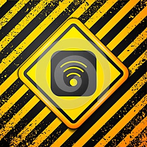 Black Wi-Fi wireless internet network symbol icon isolated on yellow background. Warning sign. Vector