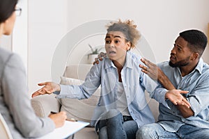 Black Wife Blaming Husband And Waving Hands During Couples Therapy