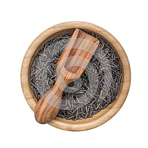 Black wild rice and olive wood scoop in a wooden bowl
