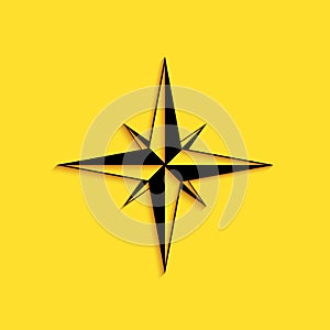 Black Wind rose icon isolated on yellow background. Compass icon for travel. Navigation design. Long shadow style