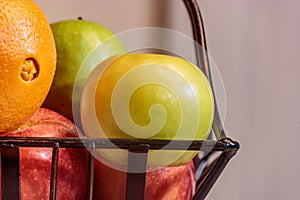 Wire basket with fruit