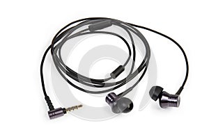 Black wired in-ear earphones on a white background photo