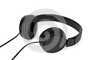 Black wired headphones isolated on white background