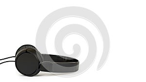 Black wired headphones isolated on white background. copy space, template