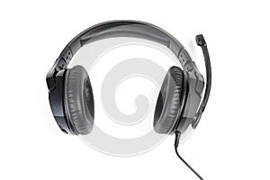 Black wired headset with full size headphones close-up