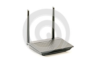 Black Wireless internet network wi-fi Router with two antenna isolated on white background. With clipping path.