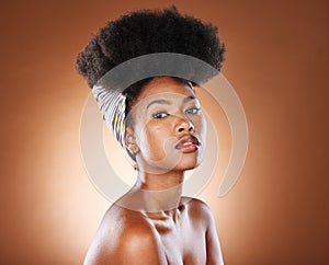 Black woman afro, hair and fashion in beauty skincare, cosmetics or makeup against a studio background. Portrait of