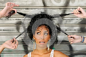 Black woman, afro hairstyle, in the city