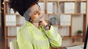 Black woman, call center and neck pain by computer in stress, burnout or suffering strain at office. Stressed or tired