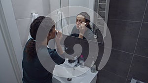 Black Woman Cleaning Face With Cosmetic Cotton Pad, Removing Makeup