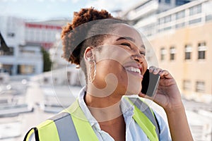 Black woman, construction and worker with phone call in city for civil engineering, building industry or site contractor