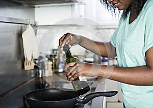 Black woman cooking in the kitchen