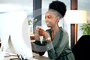 Black woman at desk with smile, computer and coffee cup, African receptionist reading email or report online. Happy