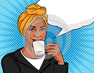 Black woman is drinking coffee.