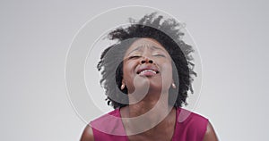 Black woman, face with crying and sad in a studio, mental health trauma and drama on white background. Disaster, grief