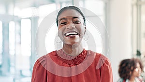 Black woman, face and laughing with smile at office in confidence for career, job or positive attitude. Portrait of