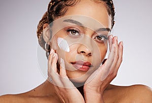 Black woman, face lotion and portrait of a young model with facial mask, moisturizer and wellness. Studio, beauty and