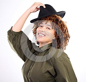 Black woman, fun hat and studio portrait of a young person laughing in isolated white background. Happiness, smile and