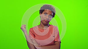 Black woman gesturing on chroma key background, asking are you crazy