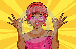 Black woman with glasses showing okay gesture action