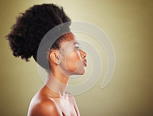 Black woman, hair and profile in studio for beauty, hair care and wellness with skin glow, shine and radiant. Natural