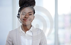 Black woman, headset and portrait in office for customer support, online service and telemarketing worker. African