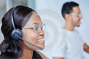 Black woman, headset and smile for customer support at call center or telemarketing sales, help desk or advisor. Female