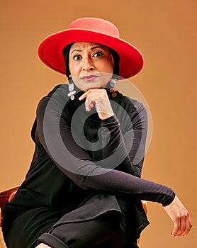 Black woman, islamic fashion portrait and serious face for beauty, trendy designer wear and modern muslim. Senior woman