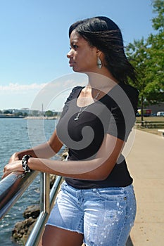 Black woman by lake Michigan